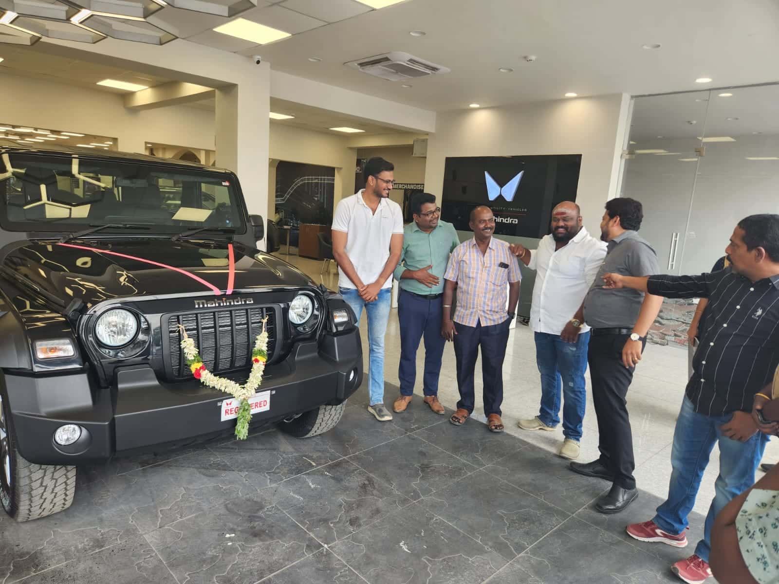 Happy customers receive new Mahindra Thar SUV through easy car loan in Madurai from Sakthi Associates