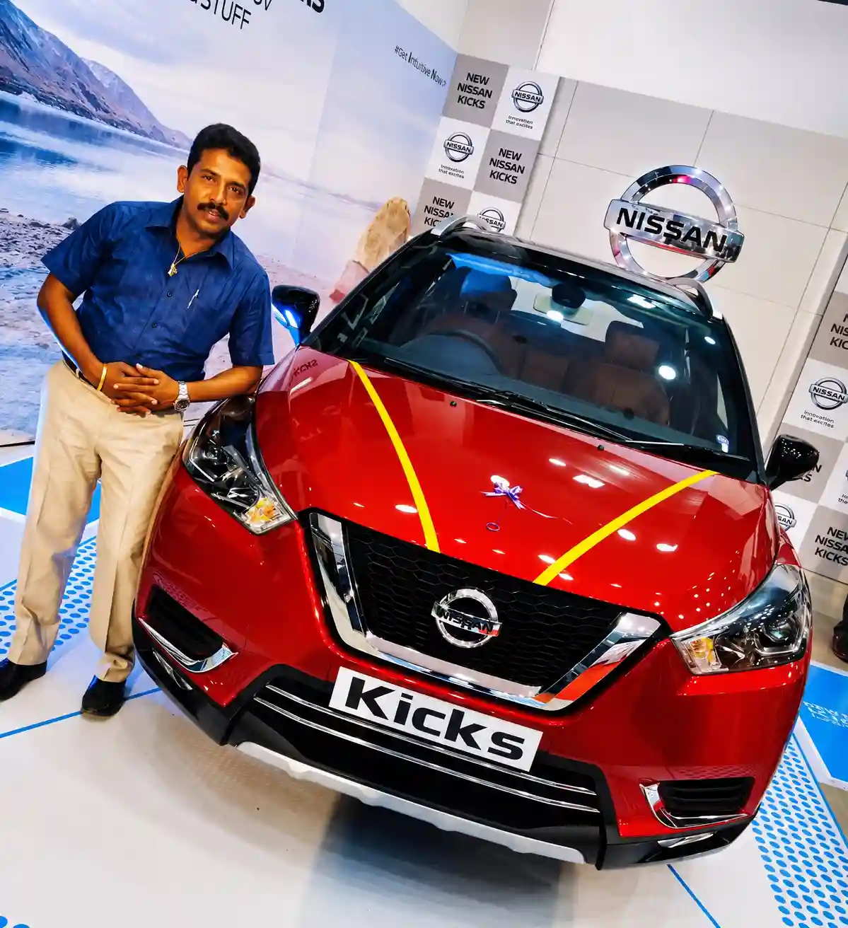 Customer celebrating new Nissan Kicks delivery via car loan in Tamil Nadu