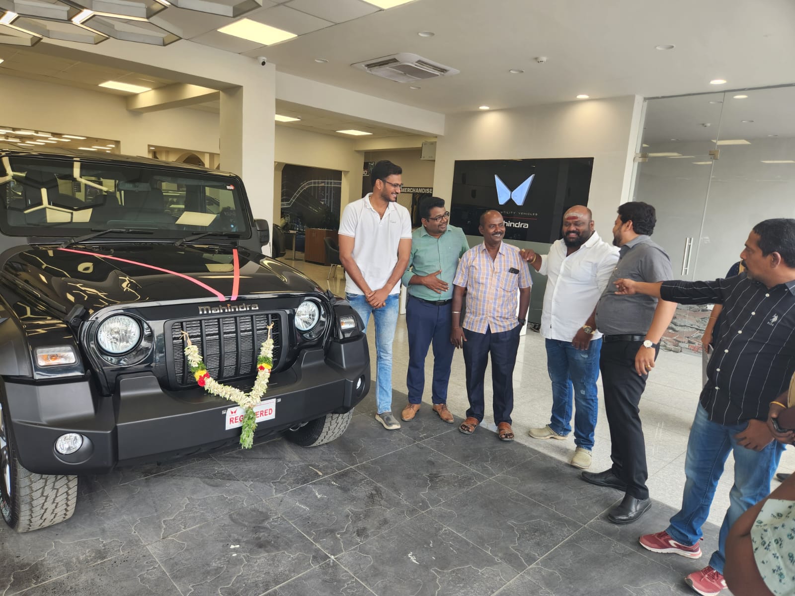 Happy customers receive new Mahindra Thar SUV through easy car loan in Madurai from Sakthi Associates
