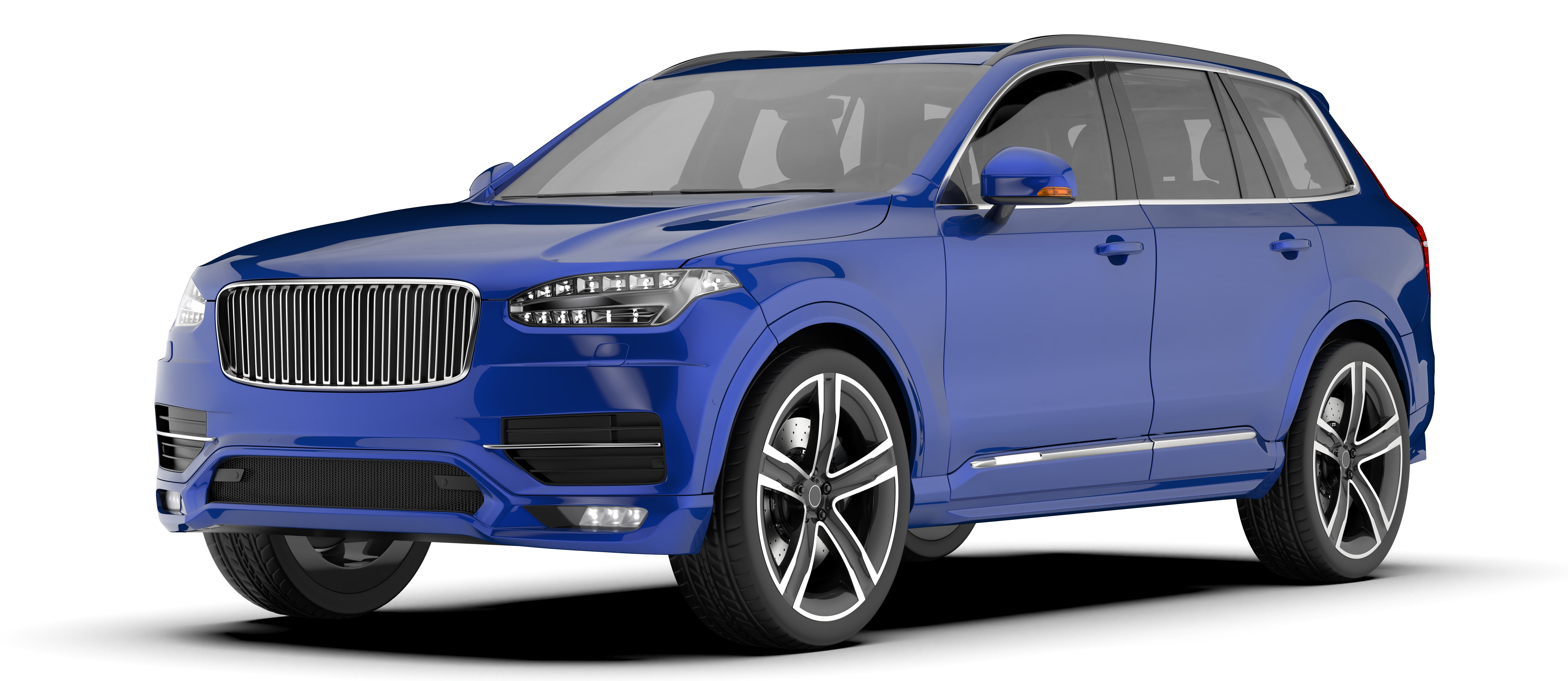 Front three-quarter view of a metallic blue luxury SUV with a vertical slat grille, Thor's Hammer headlights, chrome trim, and diamond-cut alloy wheels.
